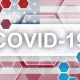 COVID-19 overtop American flag