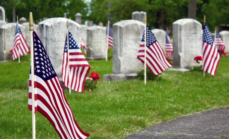 American flags on gravesites
