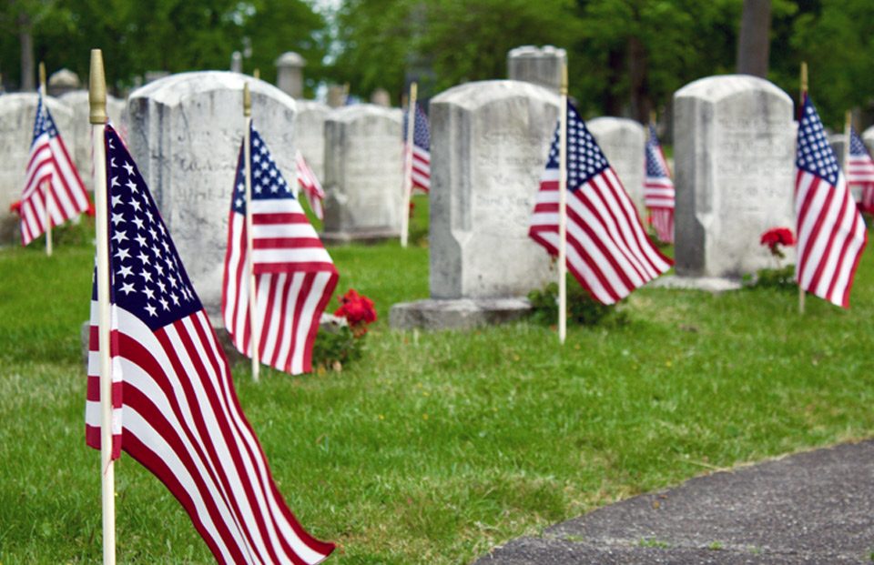 American flags on gravesites